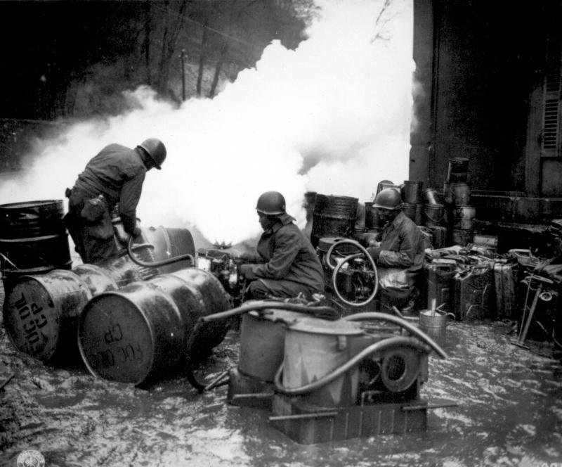 Soldiers of the 161st Chemical Smoke Generating Company laying a smoke screen