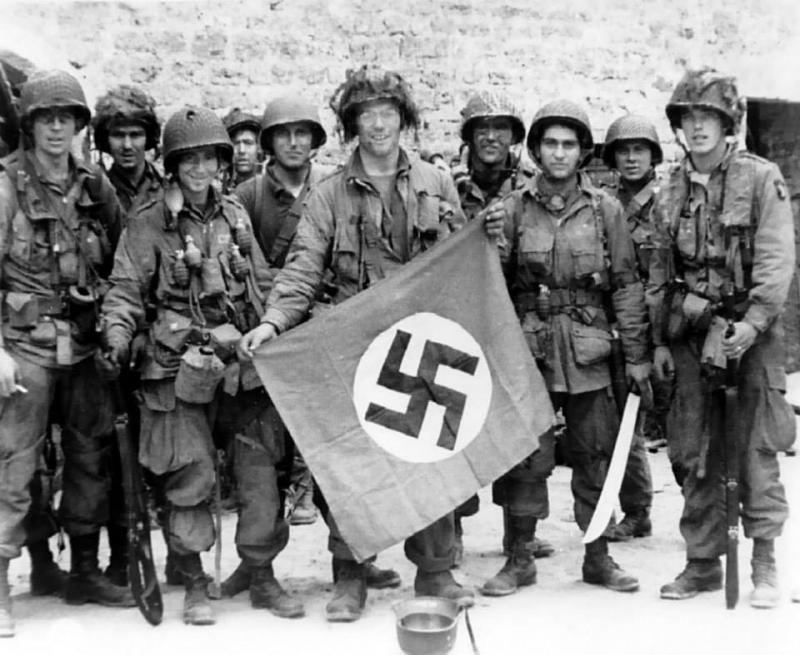 101 Airborne Division holding a Nazi German flag