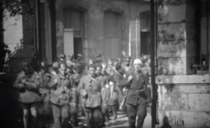 French resistance or armed civilians marching in Chartres 1944-08-18