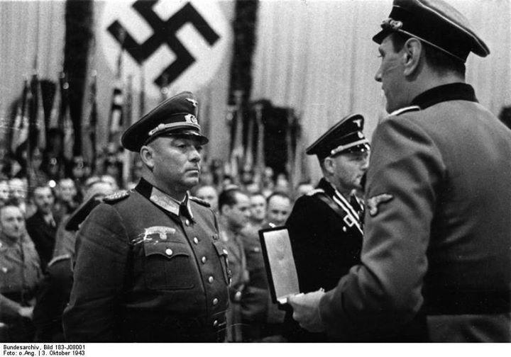 Otto Skorzeny presenting an award to Helmut Körner