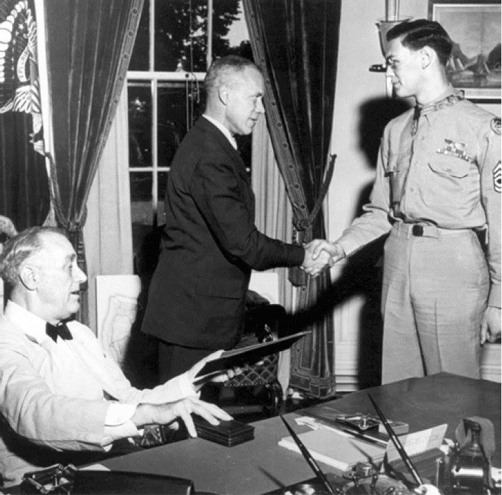 Technical Sergeant Forrest L. Vosler receiving the Medal of Honor