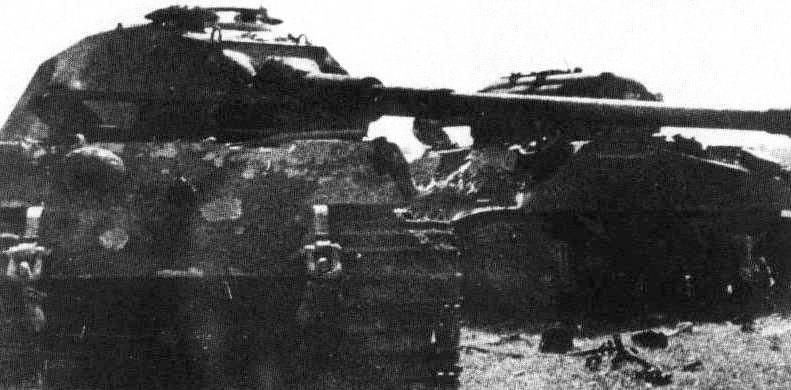 King Tiger of the 503rd heavy tank battalion, after it has been rammed by a British Sherman