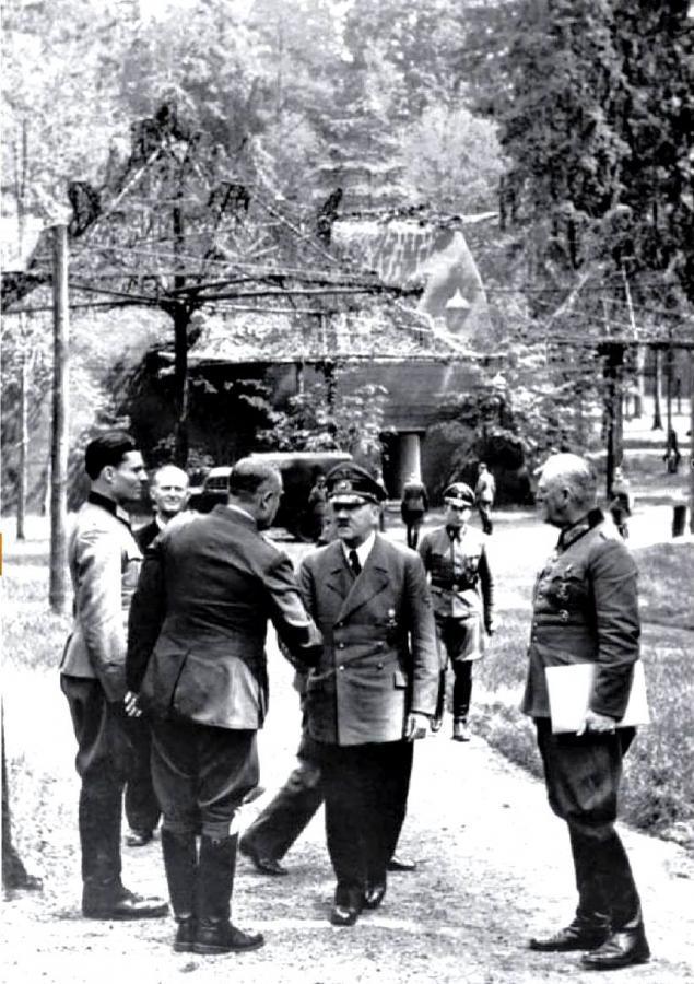 Adolf Hitler greeting Karl-Jesko von Puttkamer and Claus Schenk Graf von Stauffenberg