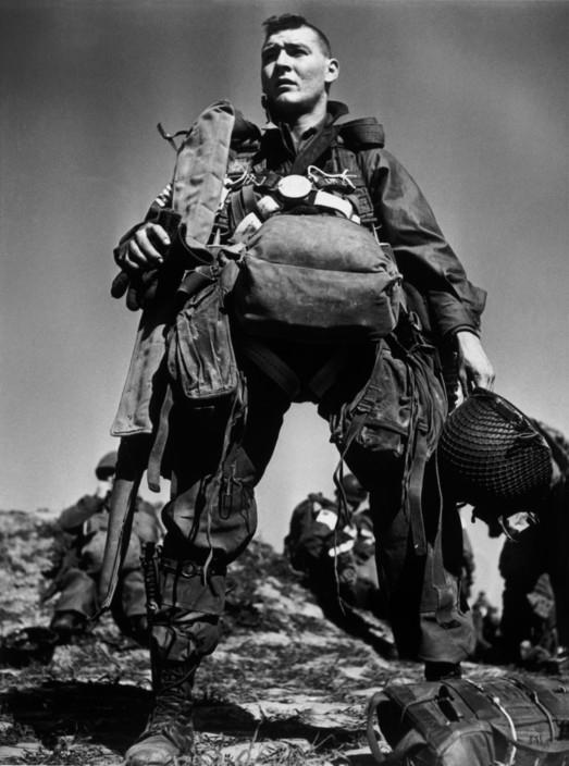Photo by Robert Capa, American Parachutist preparing to board the plane