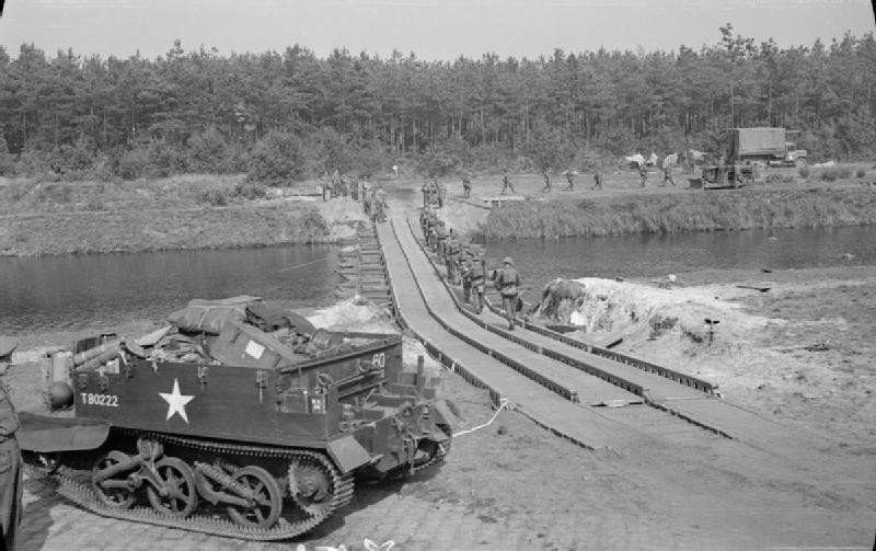 1/5th Battalion, Welch Regiment crossing a folding boat bridge