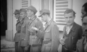 French resistance or armed civilians marching in Chartres 1944-08-18